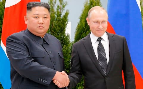 Russian President Vladimir Putin and North Korean leader Kim Jong-un meet in the far-eastern Russian port of Vladivostok  - Credit: AFP