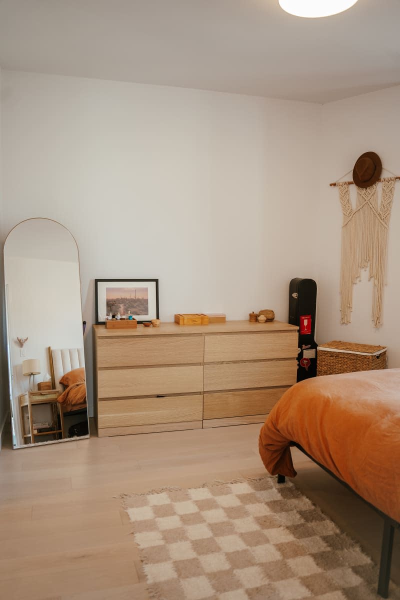 Dresser in minimalist bedroom.