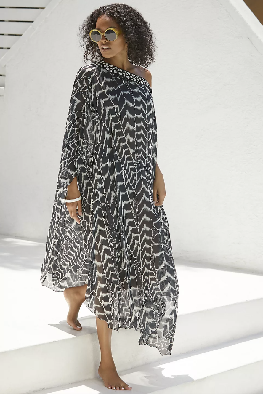 model wearing sunglasses and black and white pattern Payal Jain Sheer Coverup Maxi Dress (Photo via Anthropologie)