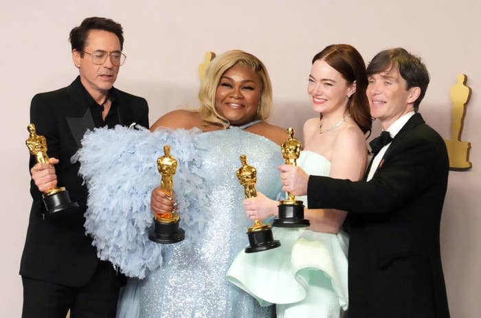 Robert Downey Jr., Da'Vine Joy Randolph, Emma Stone, and Cillian Murphy pose with their Oscars