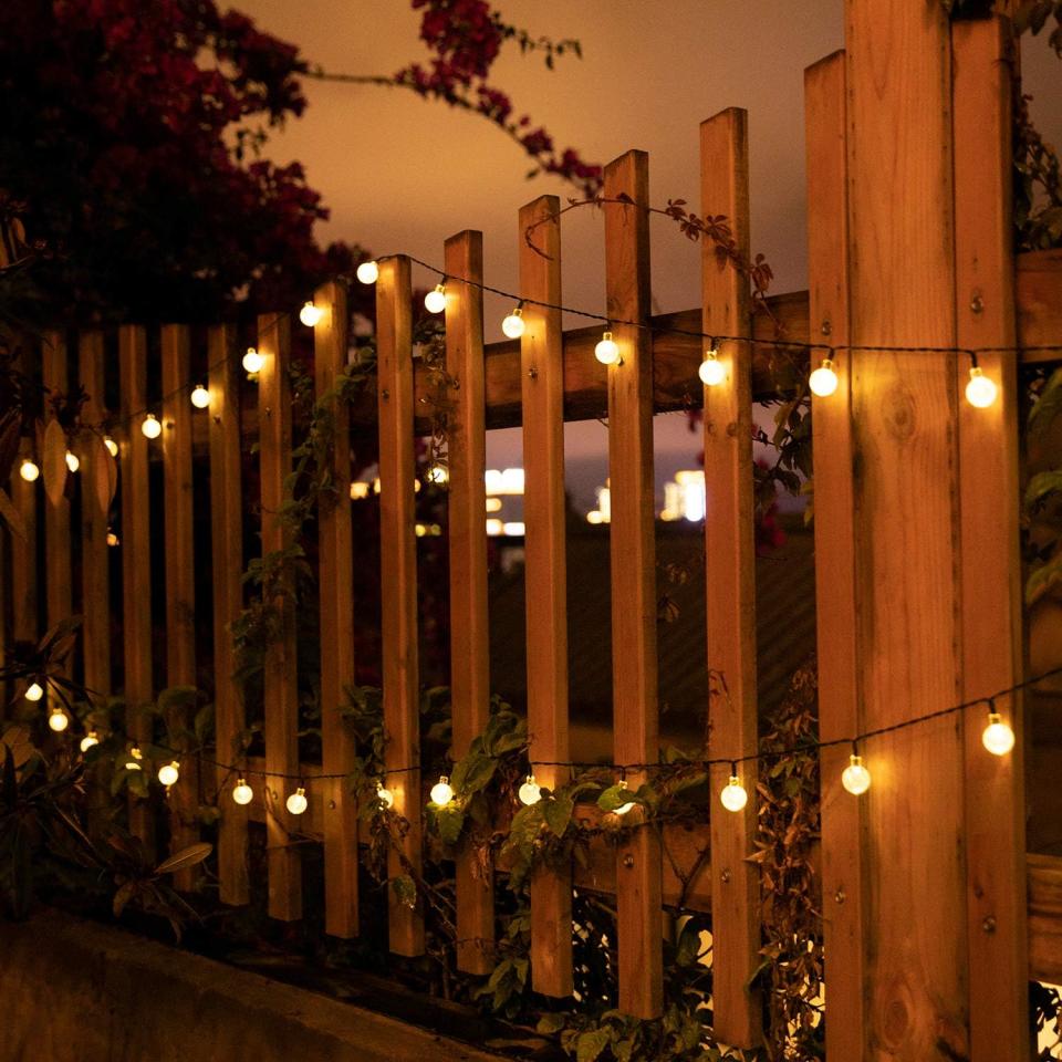 solar lights on a fence