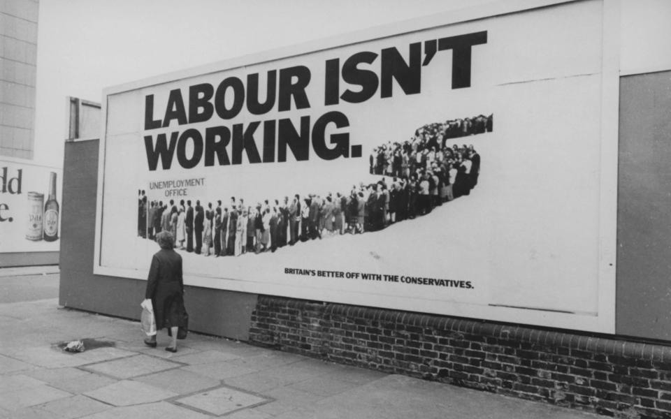 A billboard reading 'Labour Isn't Working', a Conservative Party run advertising campaign designed by the Saatchi & Saatchi advertising agency for the 1979 general election, - Chris Ware/HULTON ARCHIVE 