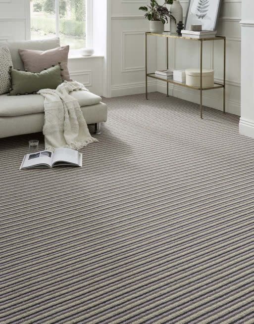 <p>Striped carpets are a very clever way to alter perspectives in your home, adding the allusion of extra depth or space. Horizontal stripes can make a room appear wider, so they are the perfect tool for compact spaces. <br></p><p>Pictured: <a href="https://www.flooringsuperstore.com/fletcher-arlington.html" rel="nofollow noopener" target="_blank" data-ylk="slk:Fletcher Arlington Carpet at Flooring Superstore;elm:context_link;itc:0;sec:content-canvas" class="link ">Fletcher Arlington Carpet at Flooring Superstore</a></p>