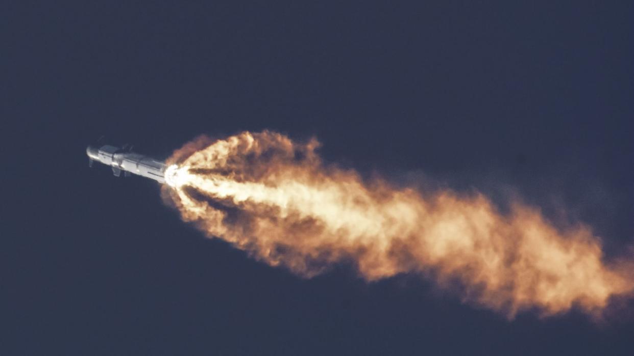  SpaceX's first fully integrated Starship vehicle rises into the South Texas sky on April 20, 2023. 