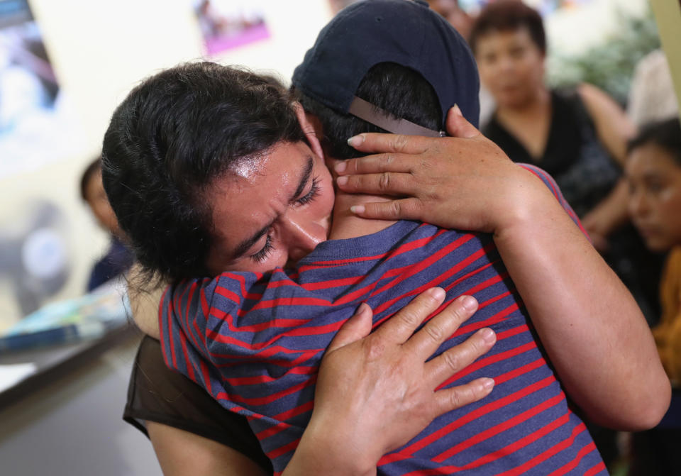 Isidra Larena Calderon hugs her son Jonathan Leonardo on Aug. 7, 2018, in Guatemala City, Guatemala. A group of nine children were flown from New York and reunited with their families, months after U.S. border agents separated them and deported their parents. (Photo: John Moore via Getty Images)