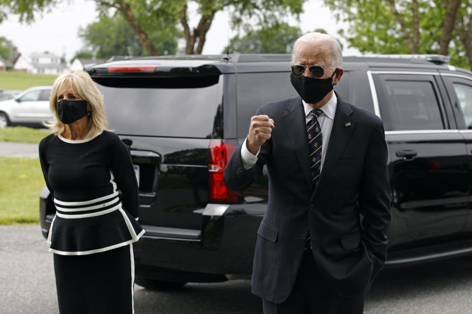 Democratic presidential candidate, former Vice President Joe Biden and Jill Biden speak with visitors after placing a wreath at the Delaware Memorial Bridge Veterans Memorial Park with Jill Biden, Monday, May 25, 2020, in New Castle, Del. (AP Photo/Patrick Semansky)