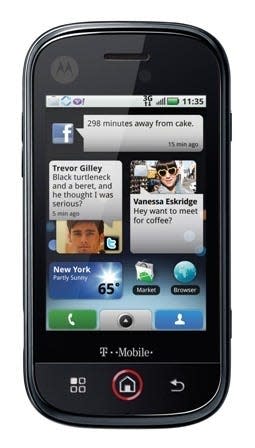 front facing motorola cliq displaying texts between two people and a Facebook notification