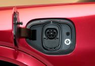 The charging socket is seen on Ford Motor Co's all-new electric Mustang Mach-E vehicle during a photo shoot at a studio in Warren, Michigan