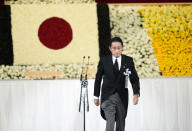 Japan's Prime Minister Fumio Kishida walks on stage during the state funeral for former Prime Minister Shinzo Abe, the longest-serving leader in his nation’s modern history, Tuesday, Sept. 27, 2022, Tokyo. Abe was assassinated in July. (Franck Robichon/Pool Photo via AP)