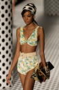 <div class="caption-credit"> Photo by: Pedro Agoas/Getty</div>Belted running shorts paired with a knotted bikini top make for one strange situation from Salinas, which debuted this design at Fashion Rio. <br>