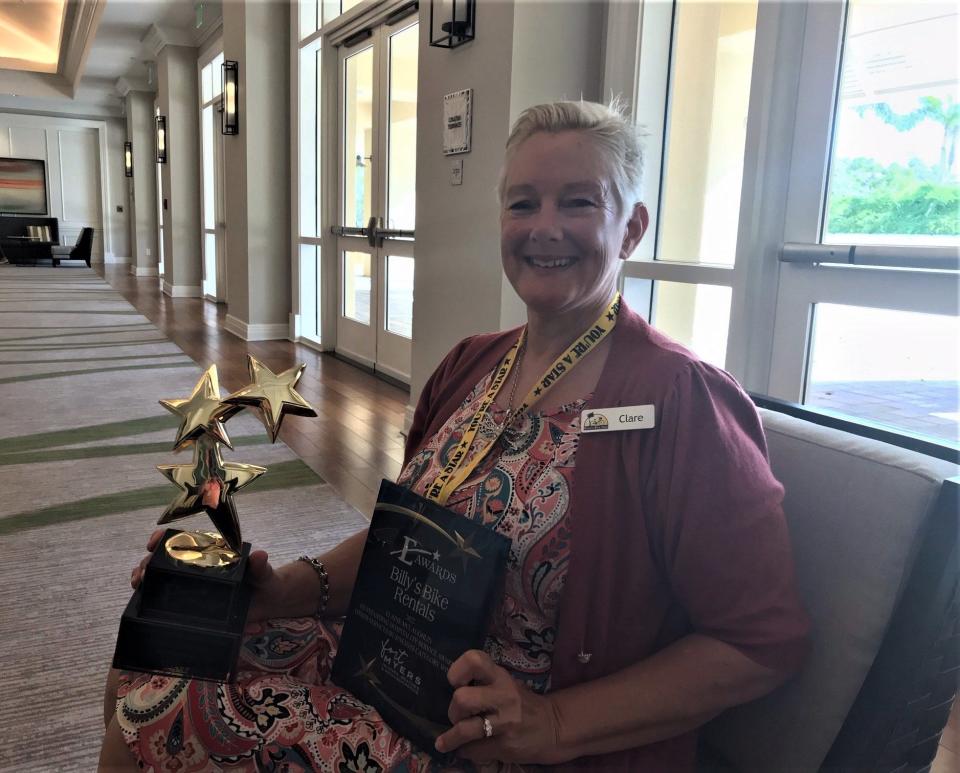 In the Know: Clare Harris of Billy's Bike Shop was one of Thursday's E Award winners after assisting a stranded bicyclist who found himself with a pair of flat tires as he encountered the debris of Sanibel Causeway.