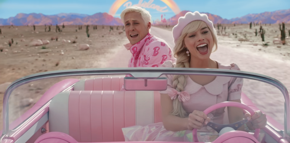 barbie driving and singing and ken in the back