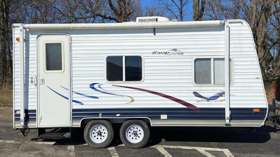 The exterior of the camper before it was renovated.