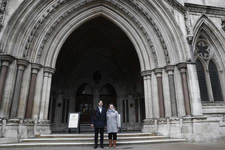 Rebecca Steinfeld (R) and Charles Keidan pose for a photograph outside the Royal Courts of Justice in central London, Britain, February 21, 2017. REUTERS/Stefan Wermuth