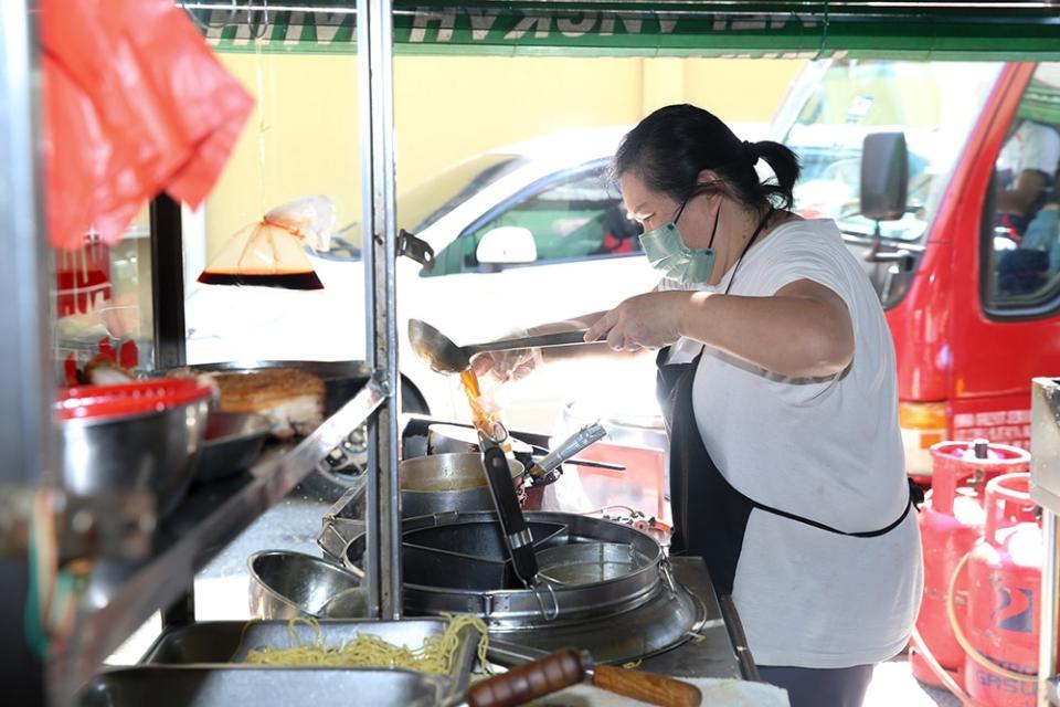 Ms Chuk who runs the roast pork noodles stall gave up an office job to be a hawker about 11 years ago.