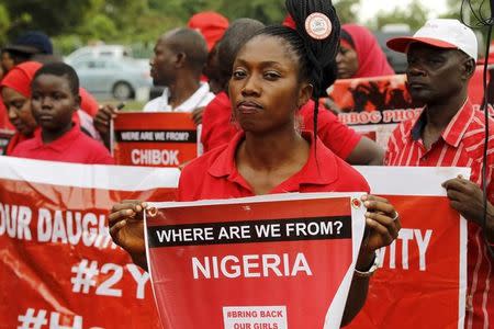 Members of the Bring Back Our Girls campaign group take part in a rally on the second anniversary of the abduction of Chibok school girls by Boko Haram, in Abuja, Nigeria, April 14, 2016. REUTERS/Afolabi Sotunde/Files
