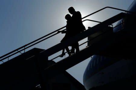 U.S. President Donald Trump and first lady Melania Trump arrive aboard Air Force One at Fiumicino Leonardo da Vinci International Airport in Rome, Italy May 23, 2017.  REUTERS/Jonathan Ernst