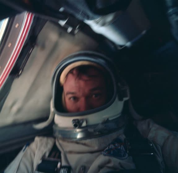 Pilot Michael Collins takes space selfie from the flight deck in 1966.