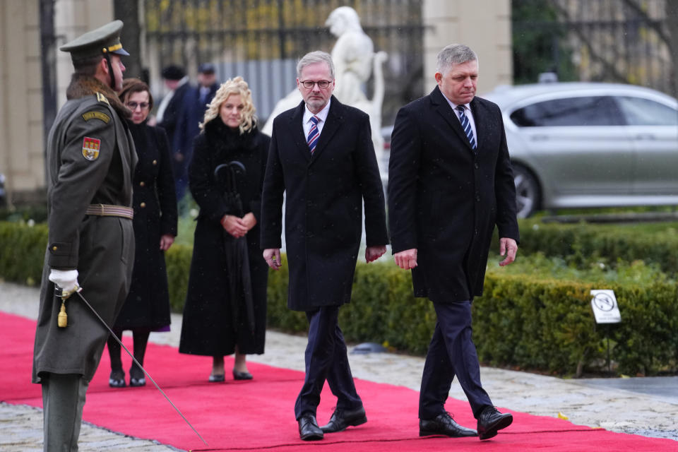 Czech Republic's Prime Minister Petr Fiala welcomes his Slovakia's counterpart Robert Fico, right, to Prague, Czech Republic, Friday, Nov. 24, 2023. (AP Photo/Petr David Josek)