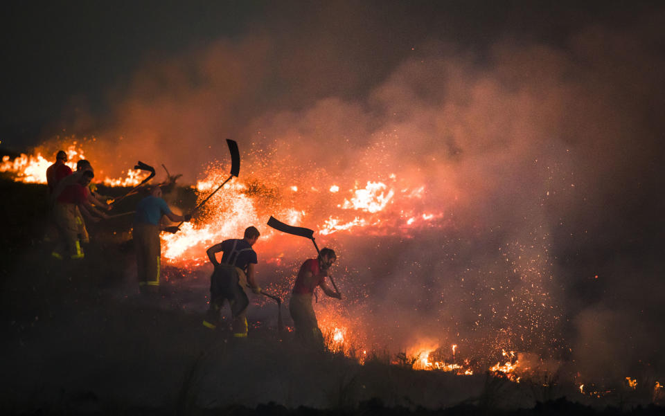 <em>The blaze was declared a major incident after two fires merged (Picture: PA)</em>