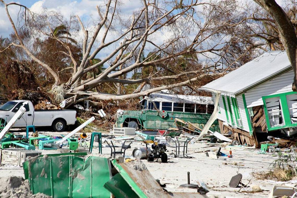 Homes across Fort Myers Beach collapsed during Hurricane Ian. Hurricane Ian also flooded many cars, trucks and SUVs, which lay destroyed around the city. (Douglas R. Clifford/Tampa Bay Times/TNS)