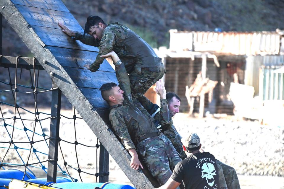Army soldiers water obstacle French Desert Commando Course