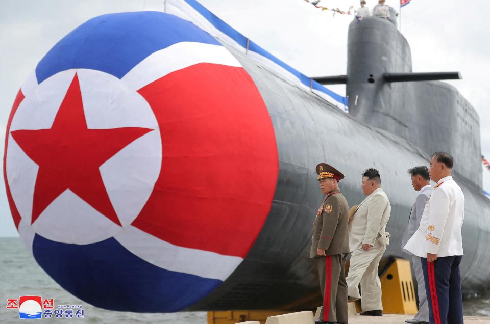 North Korean leader Kim Jong Un attends what state media report was a launching ceremony for a new tactical nuclear attack submarine in North Korea, in this picture released by North Korea's Korean Central News Agency (KCNA) on September 8, 2023.