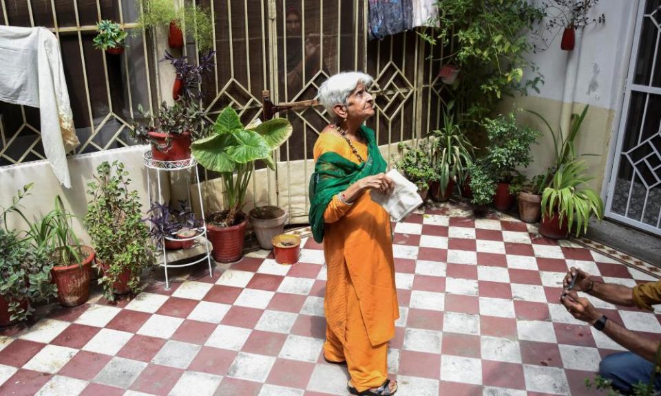 Reena in a courtyard