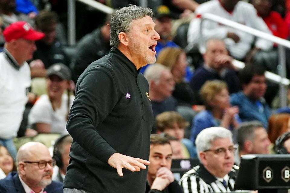 Mar 23, 2024; Pittsburgh, PA, USA; Oakland Golden Grizzlies head coach Greg Kampe calls to his team during the first half of the game against the North Carolina State Wolfpack in the second round of the 2024 NCAA Tournament at PPG Paints Arena. Mandatory Credit: Gregory Fisher-USA TODAY Sports