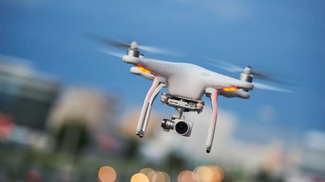 A drone with camera flying.