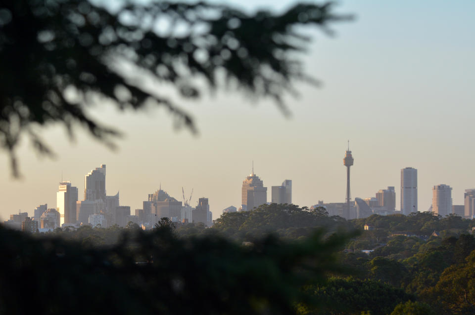 Sydney city skyline at sunrise/sunset in New South Wales, Australia.