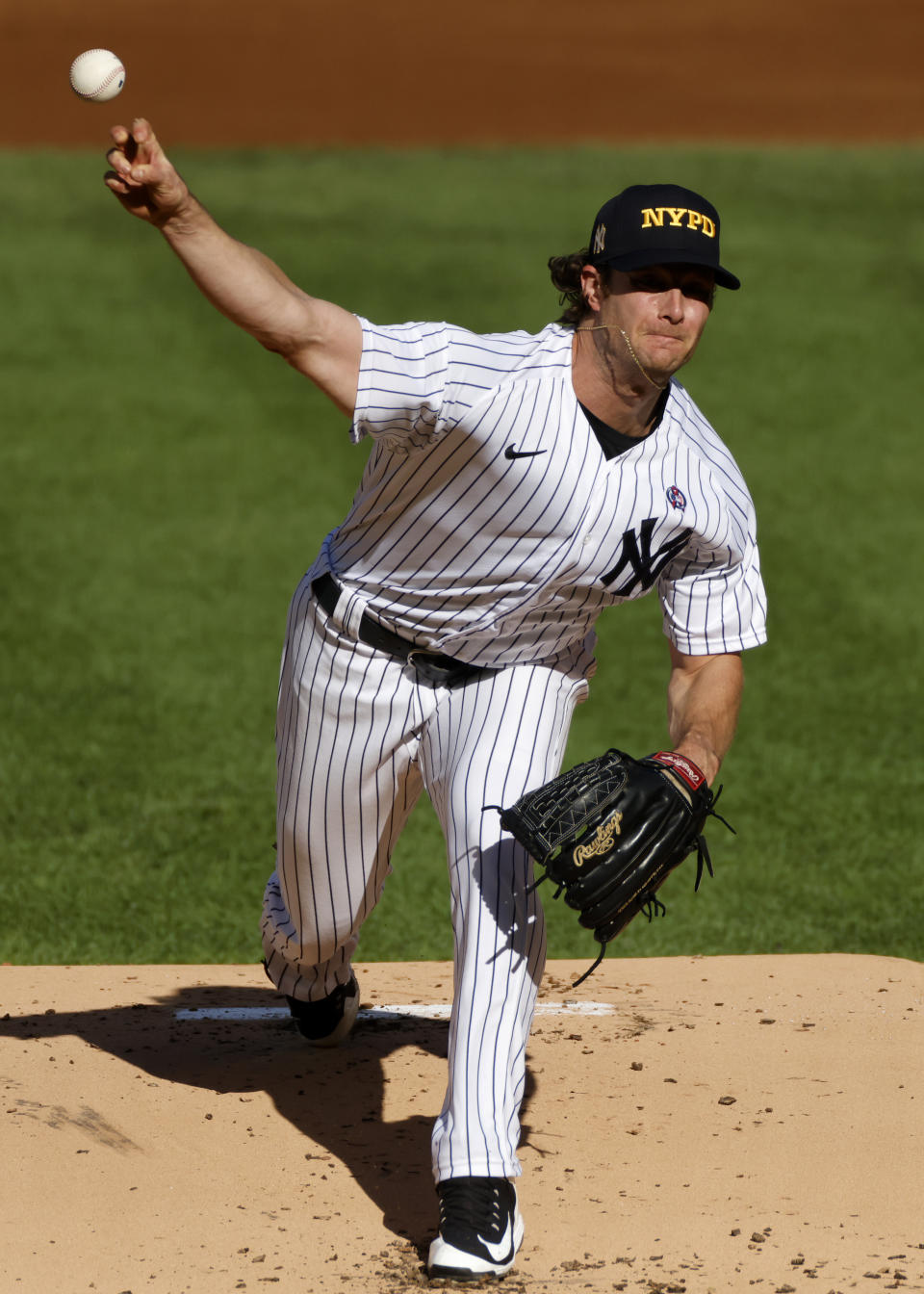 New York Yankees pitcher Gerrit Cole delivers a pitch during the first inning of the first baseball game of a doubleheader against the Baltimore Orioles, Friday, Sept. 11, 2020, in New York. (AP Photo/Adam Hunger)