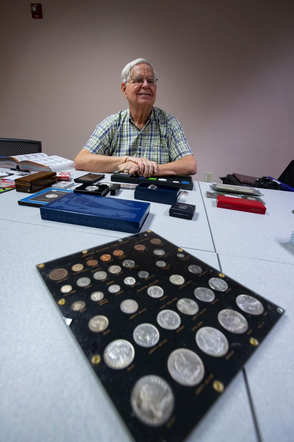 Expert numismatist Gary E. Lewis has been collecting coins since 1955. Here he displays some of the coins, tokens, medals and paper money he has collected.