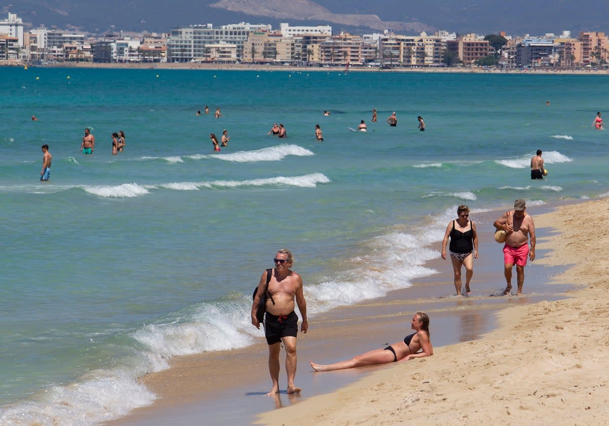 Holidaymakers in Majorca in 2021 (stock photo) (AFP via Getty Images)