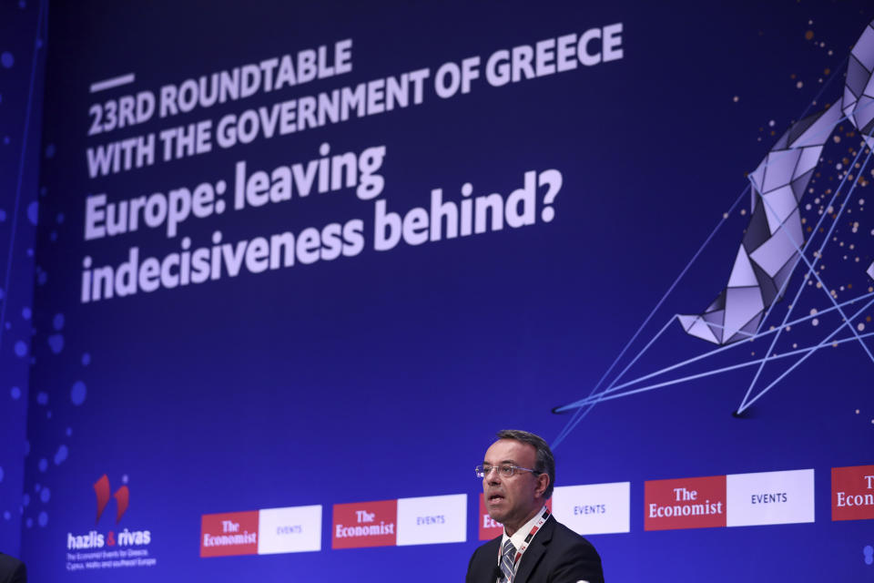 Christos Staikouras, Greece's Finance Minister, speaks at a financial conference in Lagonisi, south of Athens on Tuesday, July 16, 2019. Authorities in Greece say the country is planning tap financial markets with the issue of a 7-year bond, the first under the new conservative government of Prime Minister Kyriakos Mistotakis. (AP Photo/Yorgos Karahalis)