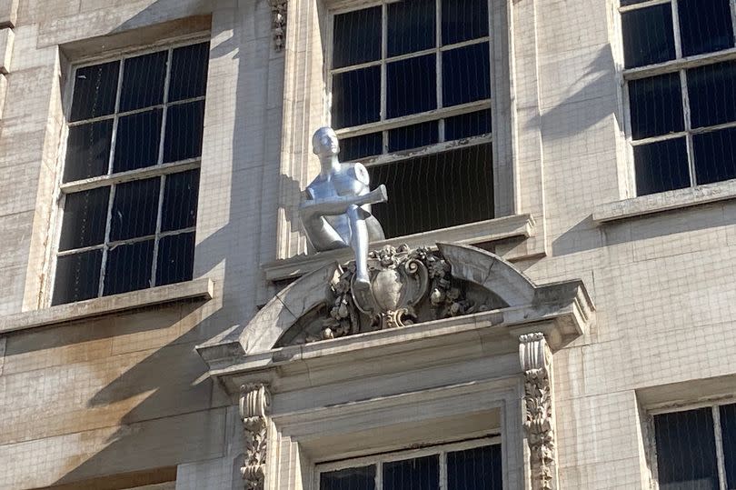 The silver mannequin at the Nottingham Debenhams building