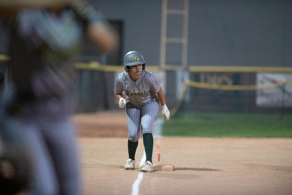 Pueblo County's Albanie Cordova watches the Pueblo East pitcher while waiting to make a run from third base during a game on Thursday, September 28, 2023.