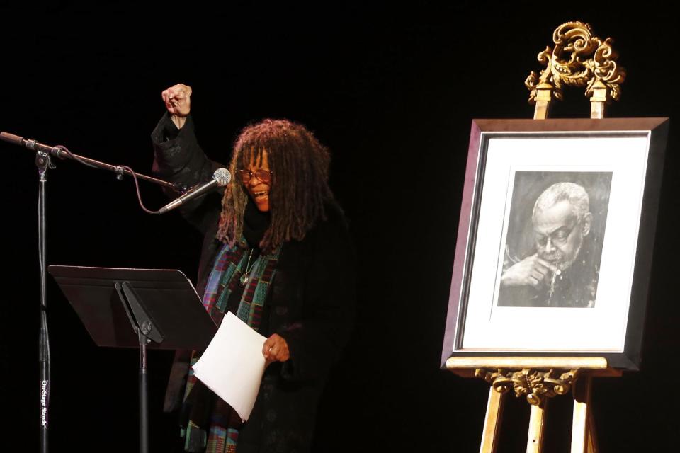 Poet Sonia Sanchez reads a poem during the funeral of poet Amiri Baraka Saturday, Jan. 18, 2014, in Newark, N.J. The 79-year-old author of blues-based poems, plays and criticism died Jan. 9 of an undisclosed illness. (AP Photo/Jason DeCrow)