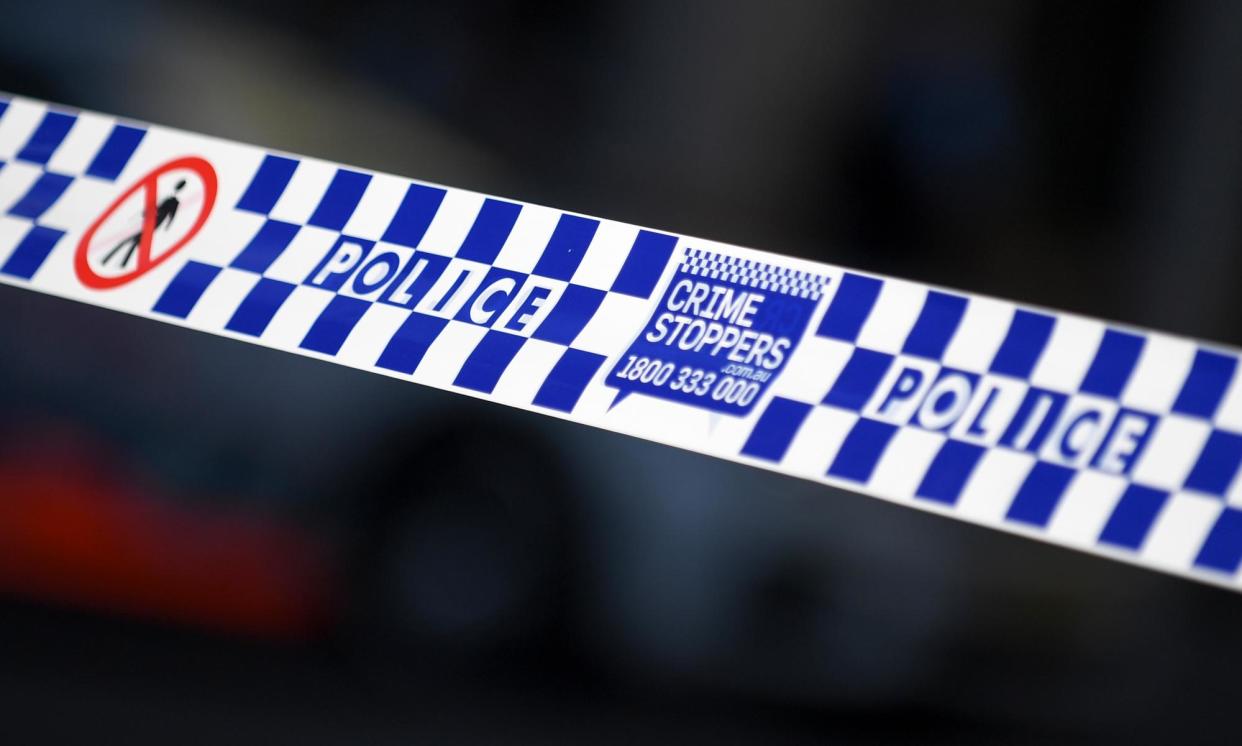 <span>A police operation was underway on Elizabeth Street in Sydney after an officer was allegedly stabbed.</span><span>Photograph: Steven Saphore/AAP</span>