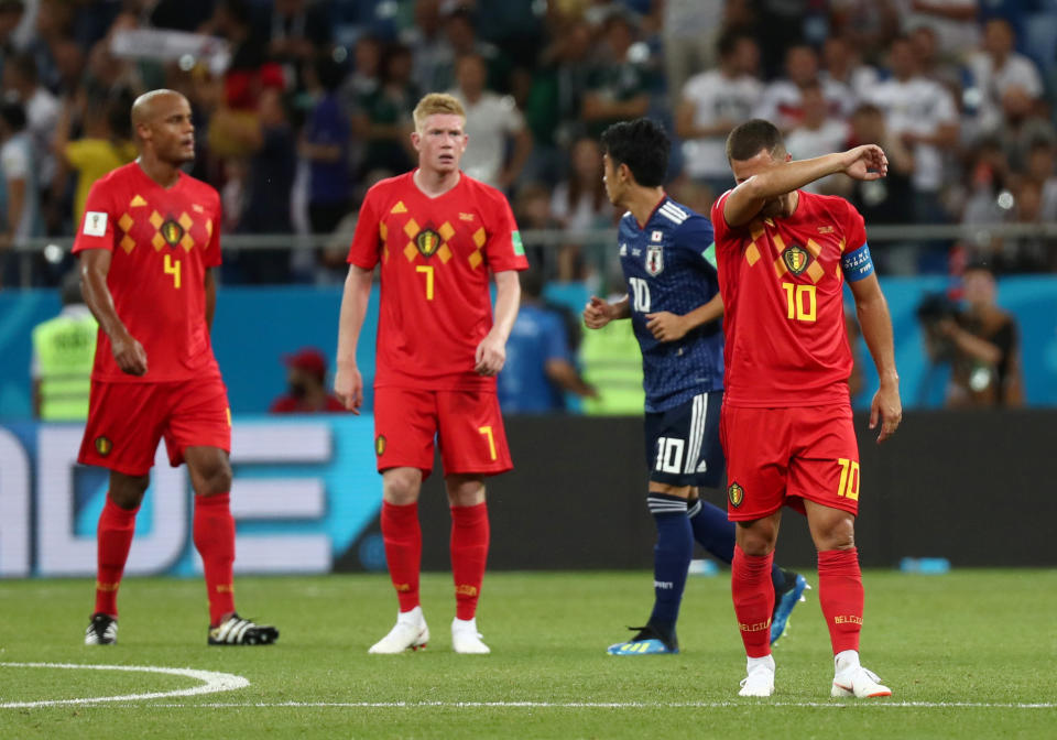 Soccer Football – World Cup – Round of 16 – Belgium vs Japan – Rostov Arena, Rostov-on-Don, Russia – July 2, 2018 Belgium’s Vincent Kompany, Kevin De Bruyne and Eden Hazard react REUTERS/Sergio Perez