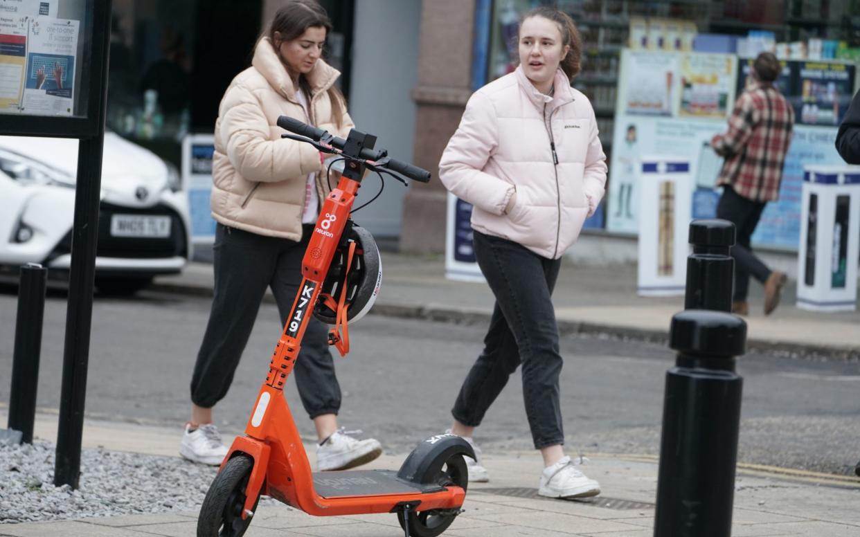 An e-scooter in Jesmond, Newcastle, where a fleet of 250 orange electric scooters has been opened up to the public - Owen Humphreys/PA