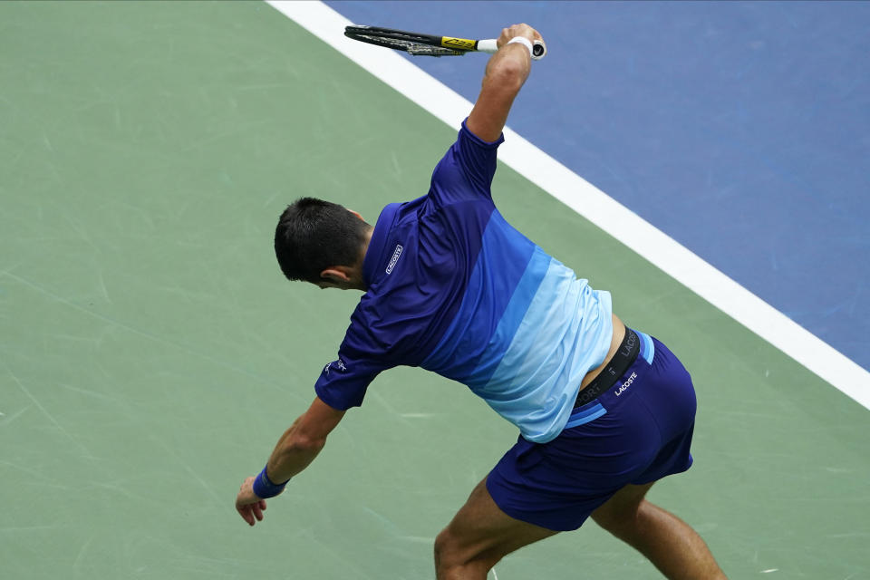 Novak Djokovic, of Serbia, smashes his racket after losing a point to Daniil Medvedev, of Russia, during the men's singles final of the US Open tennis championships, Sunday, Sept. 12, 2021, in New York. (AP Photo/Seth Wenig)