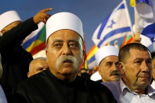 Sheikh Muafak Tarif, spititual leader of Israel's 130,000-strong Druze minority, who unlike other Arabs are required to serve in the military, joins a mass rally against the Jewish nation state law in Tel Aviv on August 4, 2018