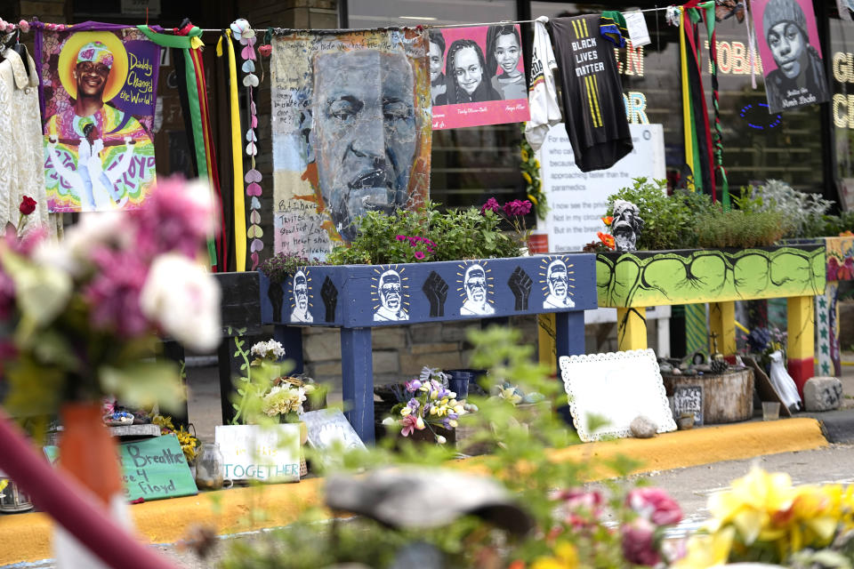 Tributes are displayed on the three-year anniversary of George Floyd's death at George Floyd Square, Thursday, May 25, 2023, in Minneapolis. The murder of Floyd at the hands of Minneapolis police, and the fervent protests that erupted around the world in response, looked to many observers like the catalyst needed for a nationwide reckoning on racism in policing. (AP Photo/Abbie Parr)