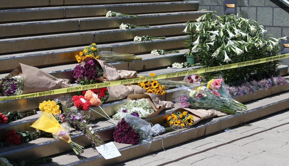 The scene outside the Old National Bank is one of remembrance for five people killed Monday when a former employee opened fire inside the office. He was shot and killed by police.April 11, 2023  