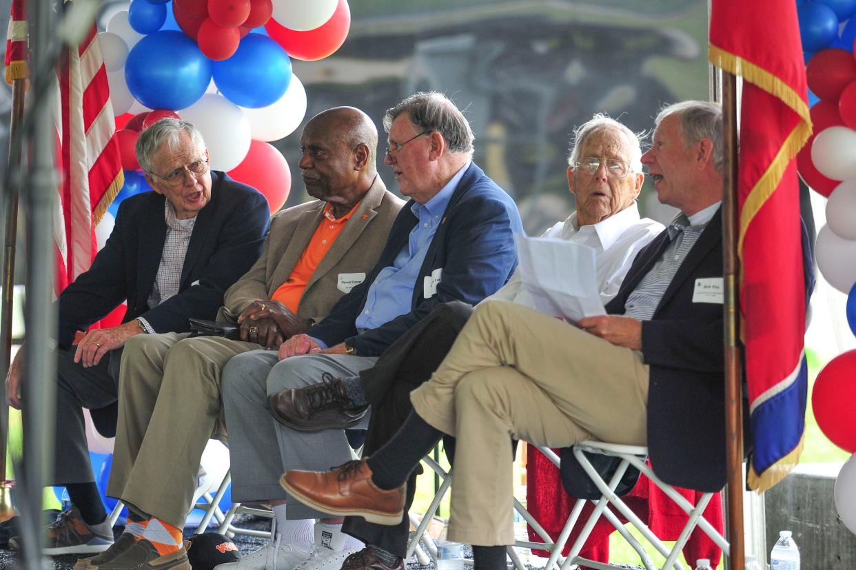 From left to right: former plant managers Bob Merriman, Harold Conner, Gordon Fee, Waldo Golliher, and Bob Ely sit on stage during the K-25 first annual reunion on Saturday, April 27, 2024 in Oak Ridge, Tenn.