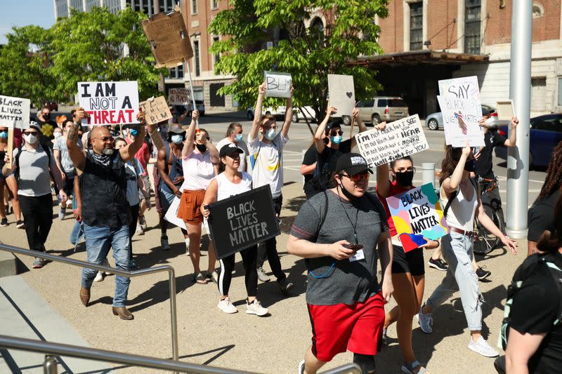 Demonstrators march in protest against the death in Minneapolis police custody of George Floyd in Niagara Square, in Buffalo