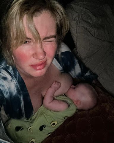 <p>Ireland Baldwin/Instagram</p> Ireland Baldwin breastfeeding daughter Holland