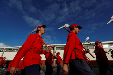 Members of firefighter school march during a training session in Oliveira do Hospital, Portugal November 10, 2018. Picture taken November 10, 2018. REUTERS/Rafael Marchante