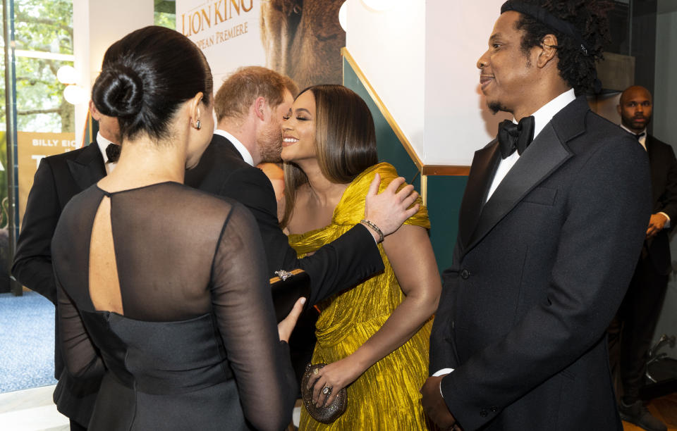 LONDON, ENGLAND - JULY 14: Prince Harry, Duke of Sussex and Meghan, Duchess of Sussex greet US singer-songwriter Beyoncé and  and US rapper Jay-Z at the European Premiere of Disney's "The Lion King" at Odeon Luxe Leicester Square on July 14, 2019 in London, England.  (Photo by Niklas Halle'n-WPA Pool/Getty Images)